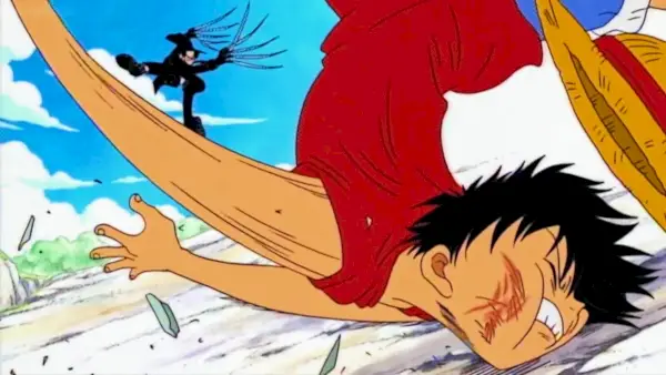 Luffy recibe un brutal puñetazo en la cara del Capitán Kuro en