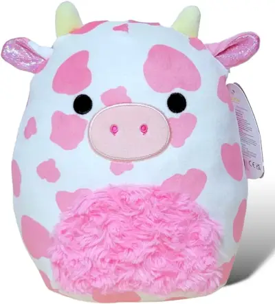 Squishmallow mucca rosa e bianco con una soffice pancia rosa