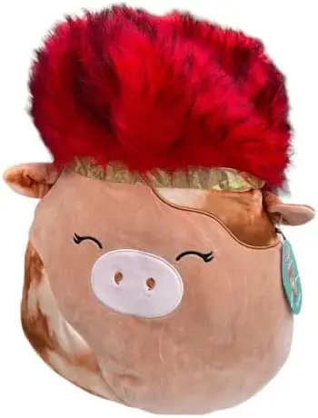 Uno Squishmallow mucca marrone con un cappello rosso punk