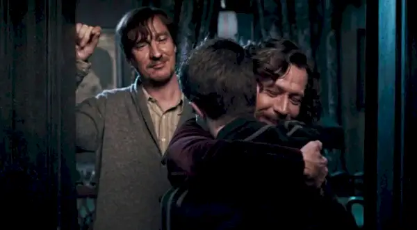 Harry Potter abbraccia Sirius Black e Remus Lupin in Harry Potter e l'Ordine della Fenice