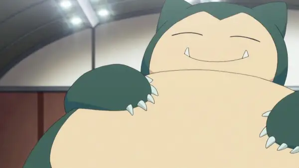 Snorlax מחייך ונראה מרוצה מעצמו (The Pokemon Company)