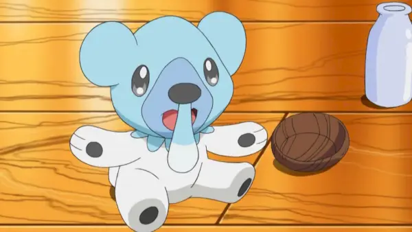 Cubchoo en el suelo junto a un cuenco y una botella (The Pokemon Company)