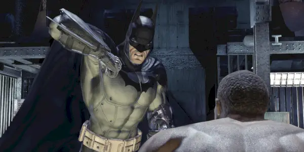 Betmens cīnās ar noziedznieku filmā Batman: Arkham Asylum