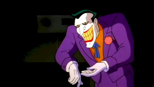 Jokerul zâmbind în serialul animat Batman. Exprimat de Mark Hamill