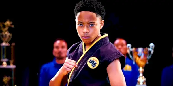 Dallas Dupree Young jako Kenny ve filmu Cobra Kai