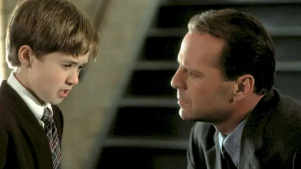 Haley Joel Osment et Bruce Willis dans