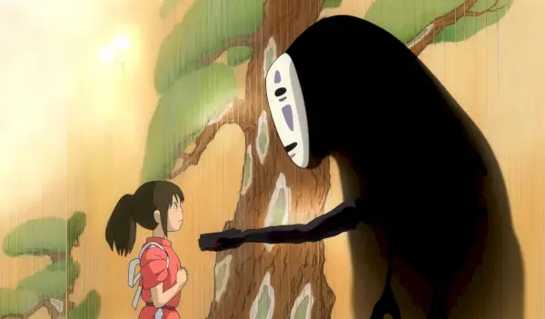 Chihiro înfruntând spiritul No-Face (Studio Ghibli)