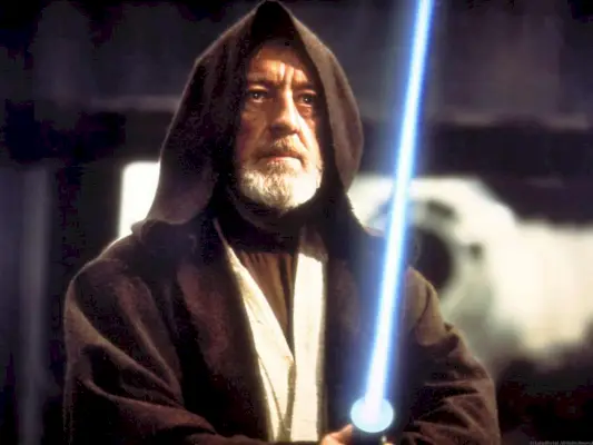 Starý Obi-Wan Kenobi so svetelným mečom